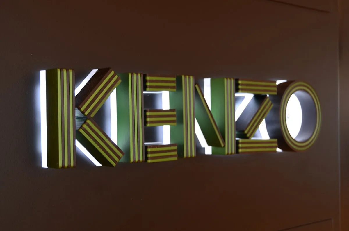 Three-dimensional backlit metal letters with fabricated depth and white LED illumination