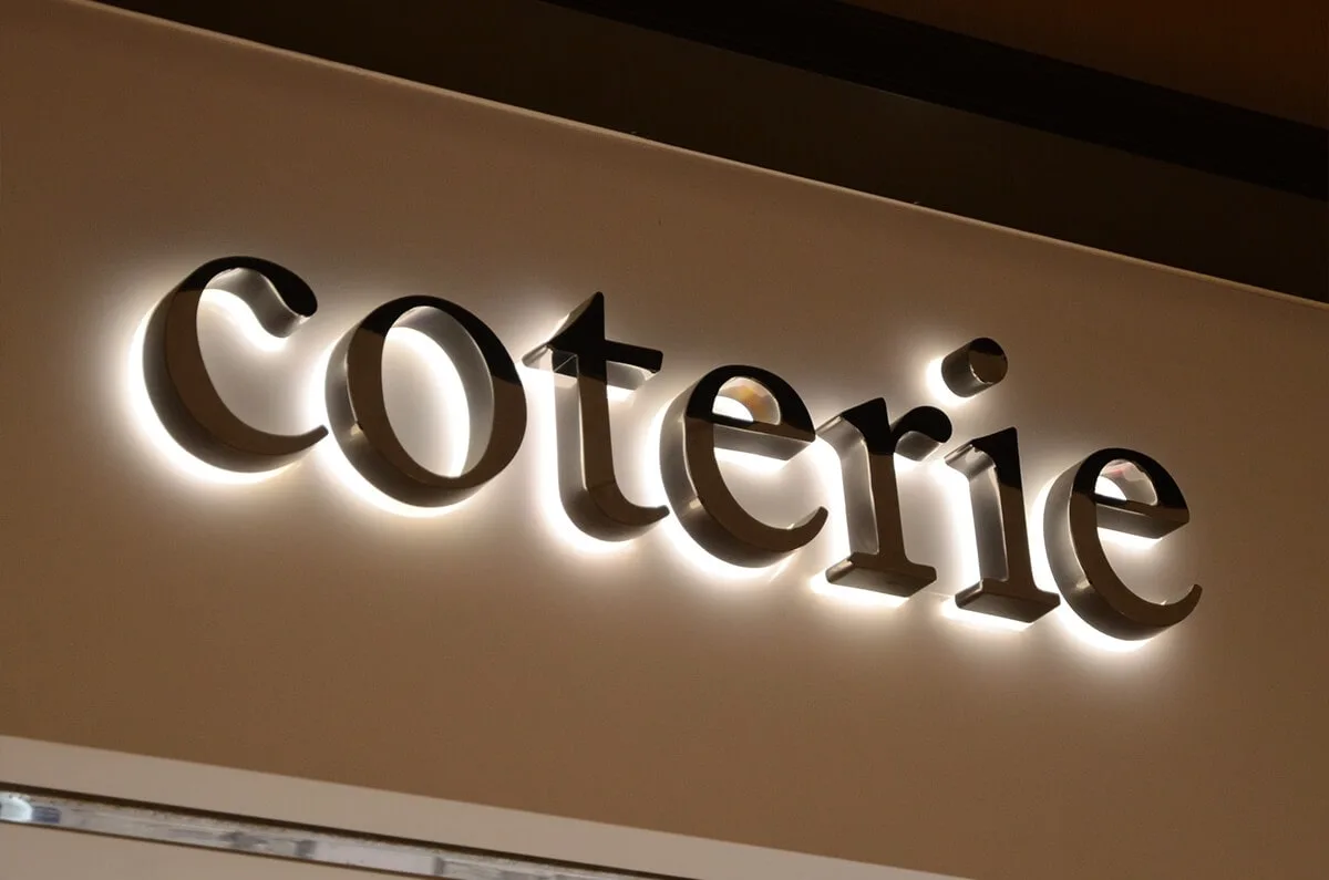 Mirror polished stainless steel backlit letters with strong white LED illumination for premium branding