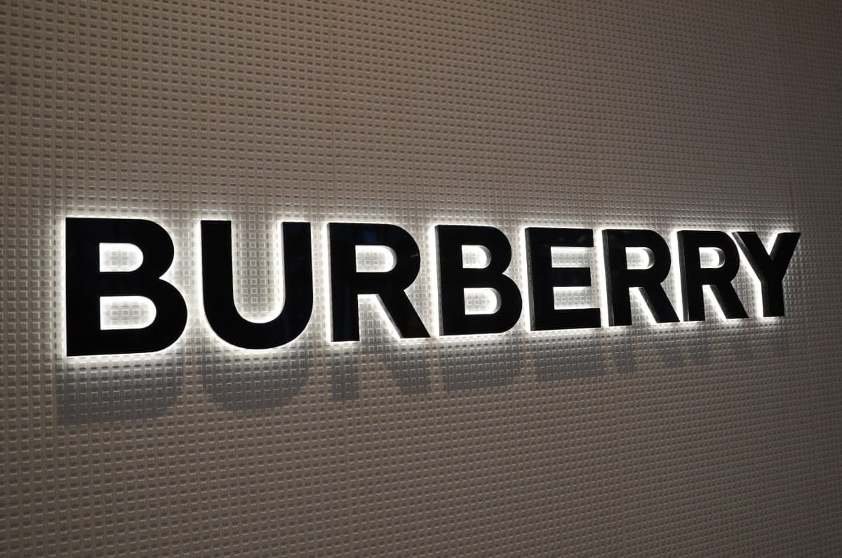 Custom backlit letters mounted on a wall with a halo glow